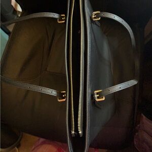 Black zippered handbag great for laptop